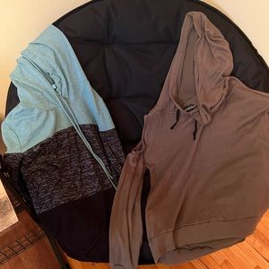 Two light weight hooded long sleeve tops
